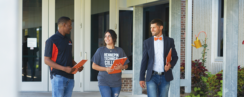 people outside entrance talking