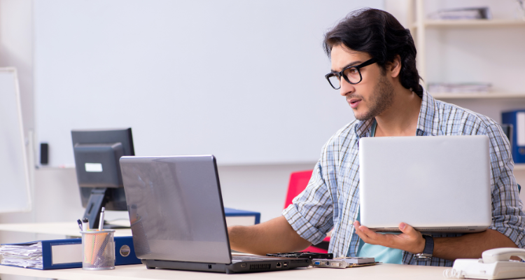 female database developer standing in front of desk