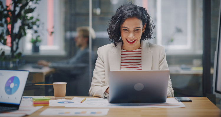 female working at desk in modern office