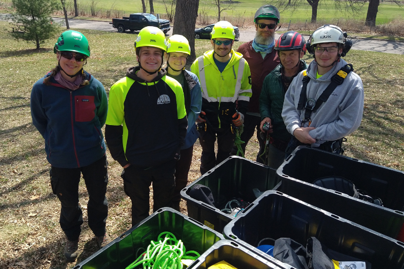 Urban Forestry class gathers around new equipment.
